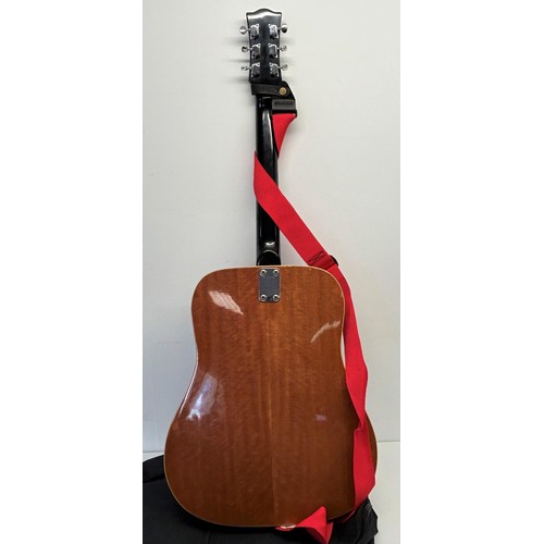 473 - An EKO acoustic guitar, No 219008, in a soft carry case