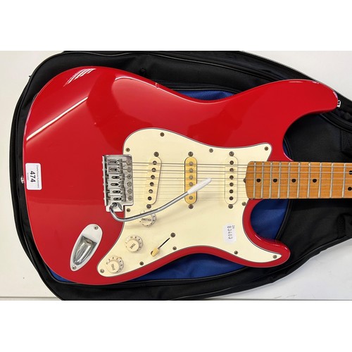 474 - A copy of a Fender Stratocaster guitar, in a soft carry case