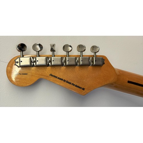 474 - A copy of a Fender Stratocaster guitar, in a soft carry case