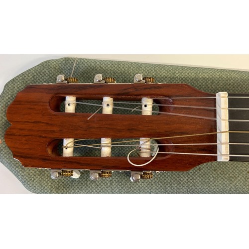 475 - A Bespana Spanish acoustic guitar, in a soft carry case