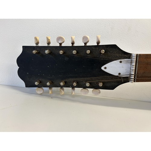 477 - A twelve string acoustic guitar