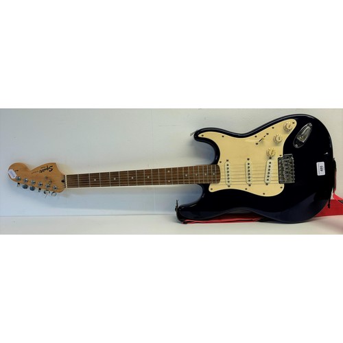 480 - A Squire Fender Stratocaster electric guitar, and stand