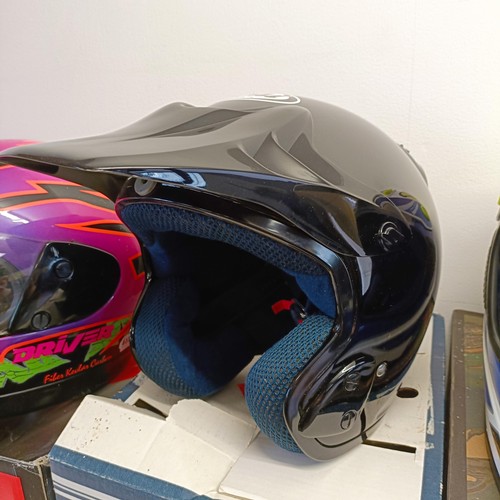 1069 - An Axo RX-5 motorcross helmet, XL 62-7 5/8, and Arai MX-3 motorcycle helmet, and another helmet (3)