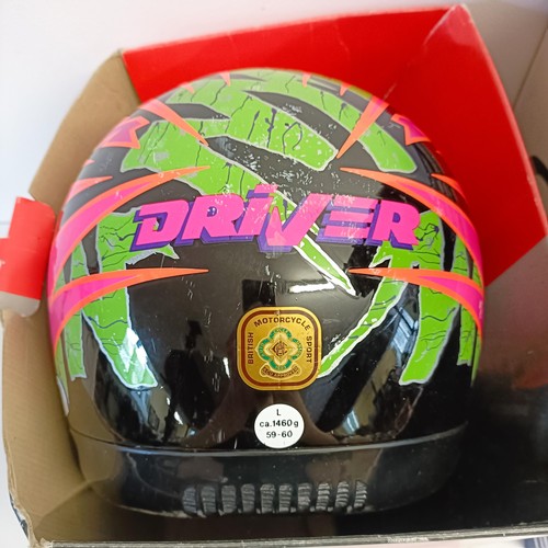 1069 - An Axo RX-5 motorcross helmet, XL 62-7 5/8, and Arai MX-3 motorcycle helmet, and another helmet (3)