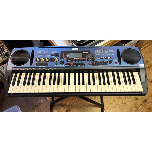 469 - A Yamaha keyboard and stand, assorted music books, and Fender guitar calendars (qty)