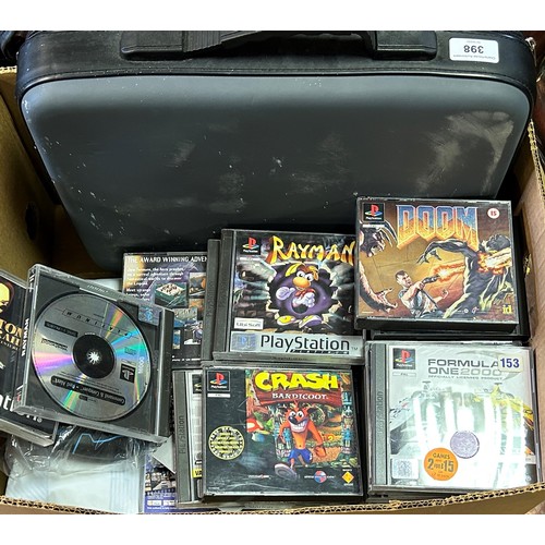 398 - A Sony Playstation 1, assorted games, a dance mat and a travel bag  Provenance:  Sold on behalf of t... 