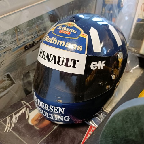 1075 - From a Damon Hill Fan: Assorted Damon Hill and other Formula One related books, collectors items and... 