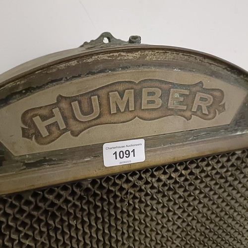 1091 - A Veteran Humber radiator, probably circa 1910, 70.5 cm wide (excluding brackets)