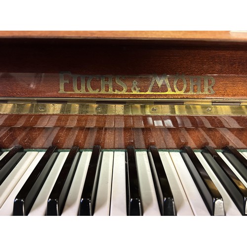 483 - A Fuchs & Mohr upright piano