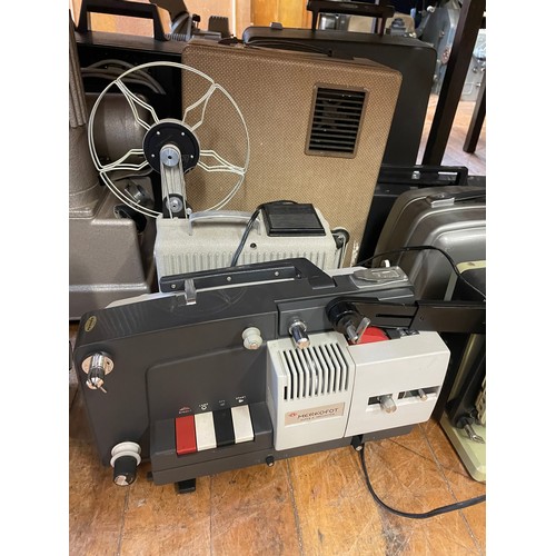 562 - A Phillips projector, assorted projectors and related items (qty)   Provenance:  From a vast single ... 