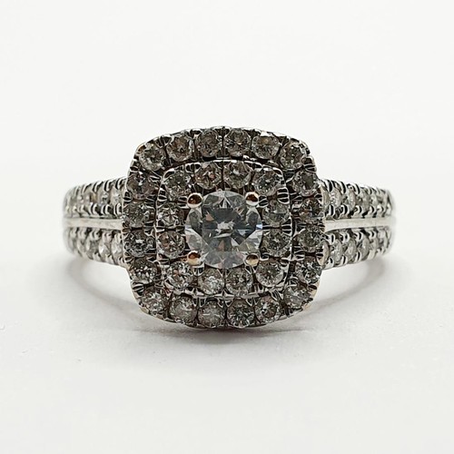 851 - An 18ct white gold and diamond cluster ring, ring size I