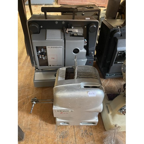 557 - A Bell & Howell Filmosound TQI projector, assorted projectors and related items (qty)  Provenance:  ... 