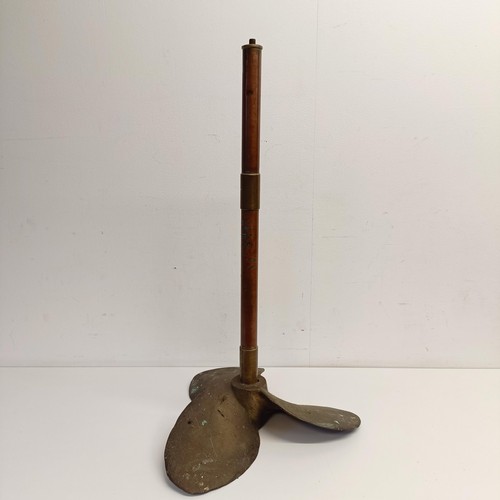 1177 - A ship's bronze propellor, mounted on a copper shaft, and previously used as a lamp