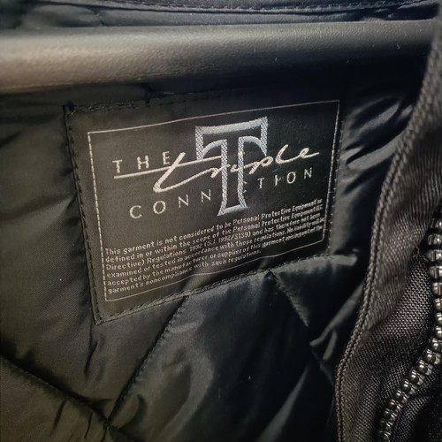 1085 - A set of Triumph Triple Connection touring motorcycle jacket, size XL, virtually unworn