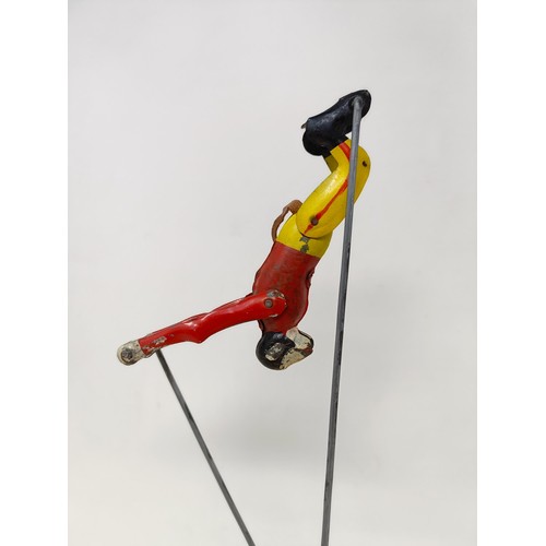 1567 - A tinplate acrobatic monkey, and a wire and fur monkey