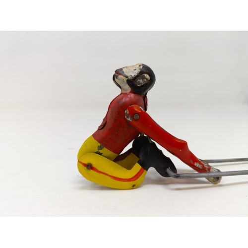 1567 - A tinplate acrobatic monkey, and a wire and fur monkey