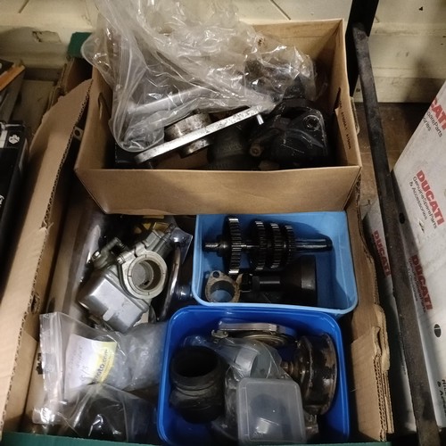 1150 - A large group of assorted motorcycle related items, including Ducati spares, Brembo calipers, Ducati... 