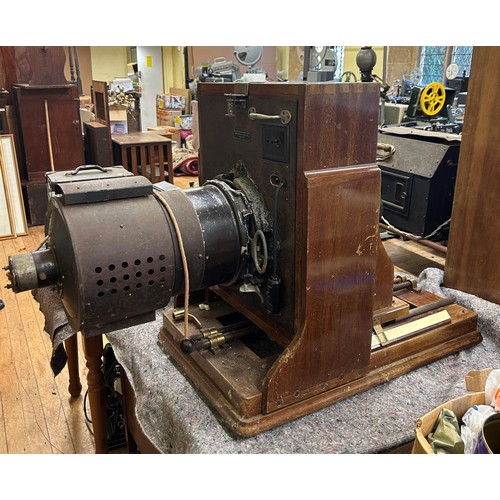 573 - A Photostat Ltd of London projector in a mahogany case, Provenance:  From a vast single owner collec... 