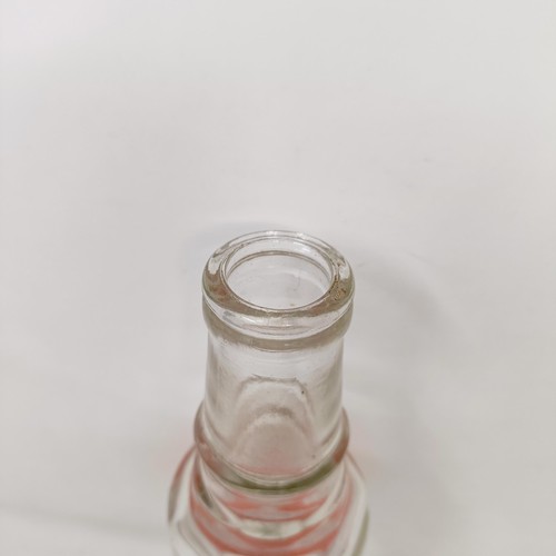 1202 - A Vigzol Motor Oil glass bottle, 28.5 cm high