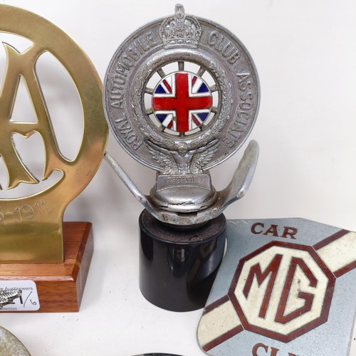 1221 - An enamel MG car club badge, an MG Owners Club badge, three AA badges, and a RAC badge (6)