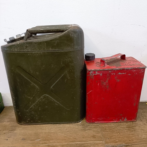 1223 - Assorted automobilia, including fire extinguishers, fuel cans, forecourt items and a quantity of spa... 