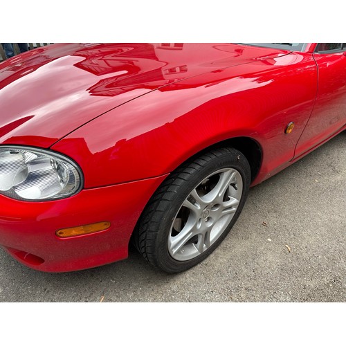 23 - 2004 Mazda MX-5
Registration YR04 KUX
Chassis number JMZNB18P600401784
Red with a black leather inte...