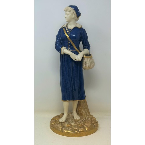 1501 - A Royal Worcester figure of a lady holding a basket, 44 cm high