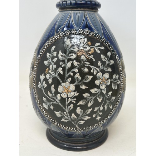 1502 - A Doulton Lambeth stoneware vase, decorated flowers, 26 cm high