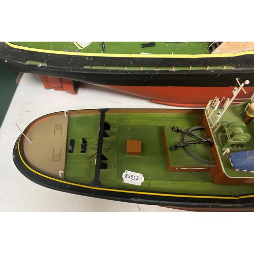 1508 - A model of a tug boat, 80 cm wide, and another, 60 cm wide (2)