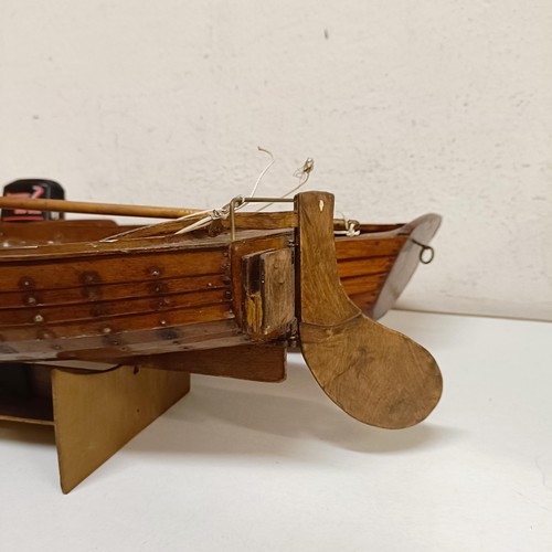 1518 - A wooden model of a clinker built boat, 50 cm wide, and another, 50 cm wide (2)