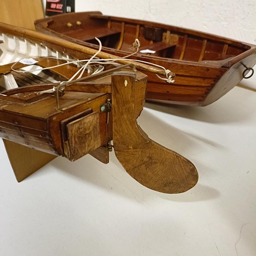 1518 - A wooden model of a clinker built boat, 50 cm wide, and another, 50 cm wide (2)