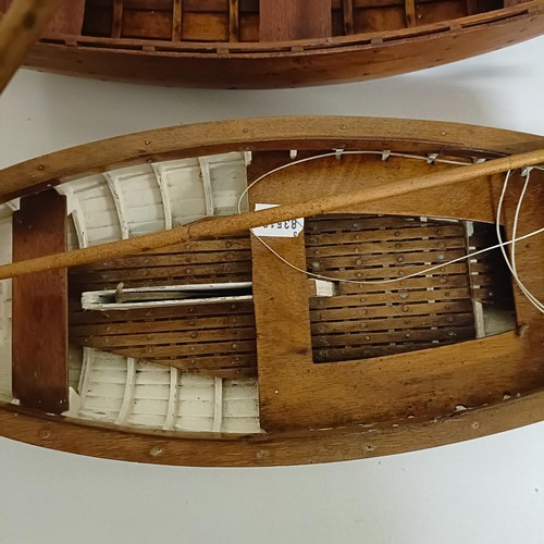 1518 - A wooden model of a clinker built boat, 50 cm wide, and another, 50 cm wide (2)