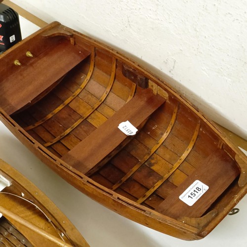 1518 - A wooden model of a clinker built boat, 50 cm wide, and another, 50 cm wide (2)