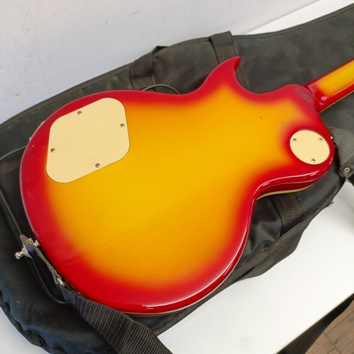 484 - A Vintage brand electric guitar, in a soft carry case