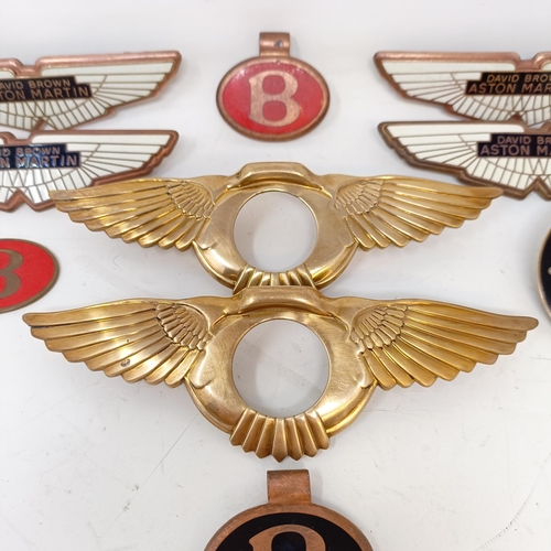 1224 - Four David Brown Aston Martin badges, an Aston Martin Lagonda badge, three B(entley) badges and a pa... 