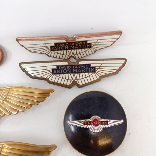 1224 - Four David Brown Aston Martin badges, an Aston Martin Lagonda badge, three B(entley) badges and a pa... 