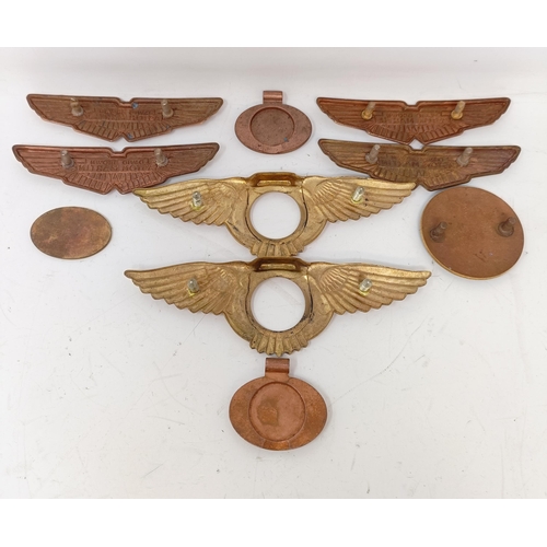 1224 - Four David Brown Aston Martin badges, an Aston Martin Lagonda badge, three B(entley) badges and a pa... 