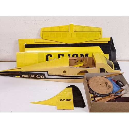 1534 - A remote control model aeroplane and assorted parts, partially constructed (qty)