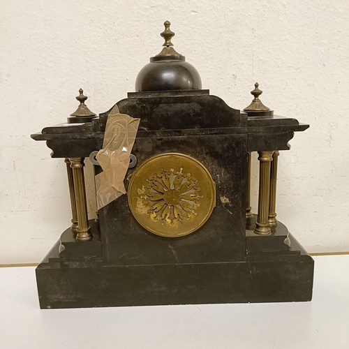 1554 - A mantel clock, in a slate case, 45 cm wide, and a wall clock in a mahogany case (2)