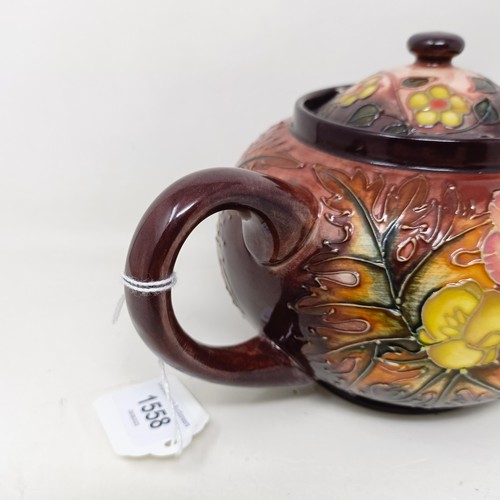 1558 - A Moorcroft pottery teapot, 15 cm high