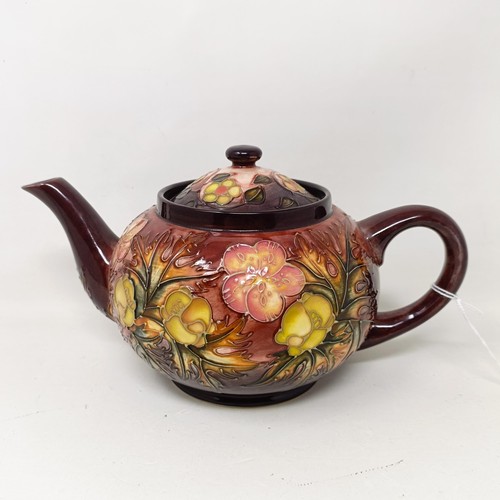 1558 - A Moorcroft pottery teapot, 15 cm high