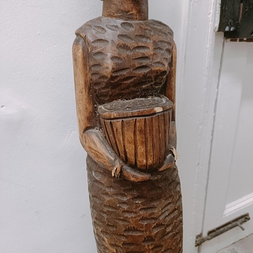 1564 - An African carving of a woman, 120 cm high 
Provenance:  Sold on behalf of SNCB Society