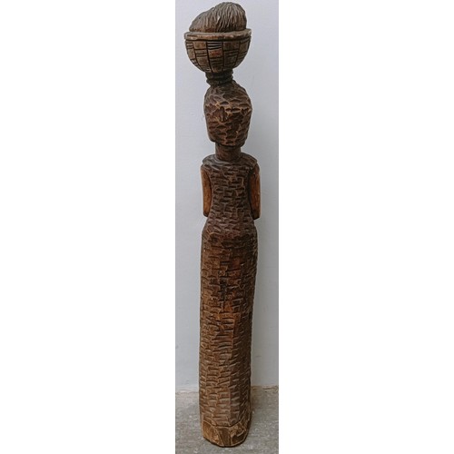 1564 - An African carving of a woman, 120 cm high 
Provenance:  Sold on behalf of SNCB Society