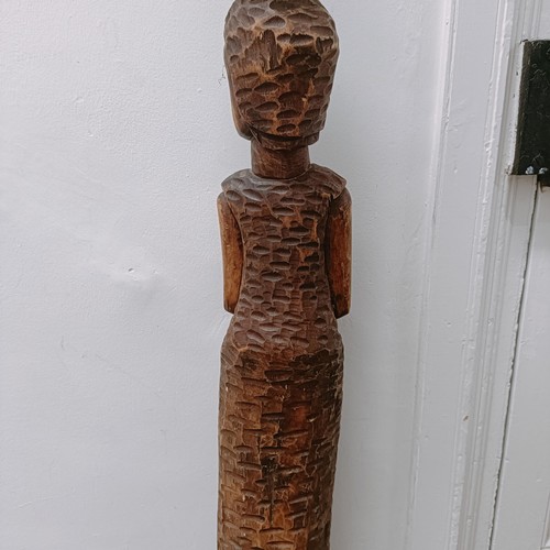 1564 - An African carving of a woman, 120 cm high 
Provenance:  Sold on behalf of SNCB Society