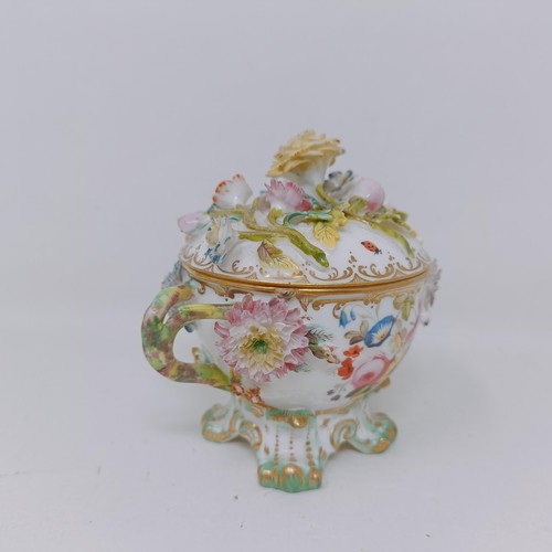 1571 - A Coalport basket decorated flowers, 20 cm wide, a cup and cover, and a chamber stick (3)