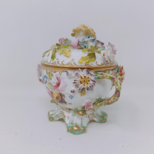 1571 - A Coalport basket decorated flowers, 20 cm wide, a cup and cover, and a chamber stick (3)