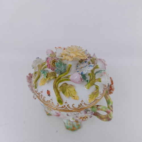 1571 - A Coalport basket decorated flowers, 20 cm wide, a cup and cover, and a chamber stick (3)