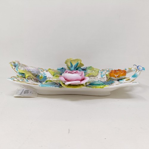 1574 - A Coalport two handled tray, decorated flowers and a building, 27 cm wide