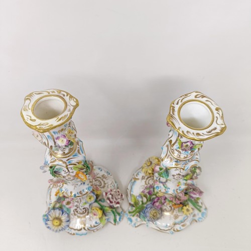 1575 - A pair of Coalport candlesticks, decorated flowers, 25 cm high (2)