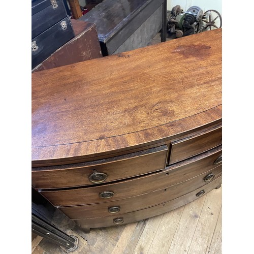 1623 - A mahogany bow front chest, of two short and three long drawers, 108 cm wide